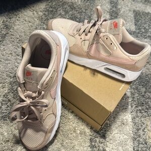Nike size 11 in women. Soft pink. Used once.